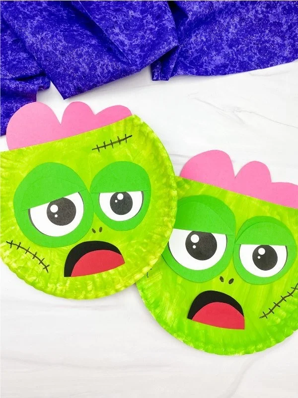 Kids making a zombie paper plate craft with a free template